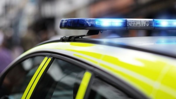 Police car with blue lights on close up ResizedImageWzYwMCwzMzhd