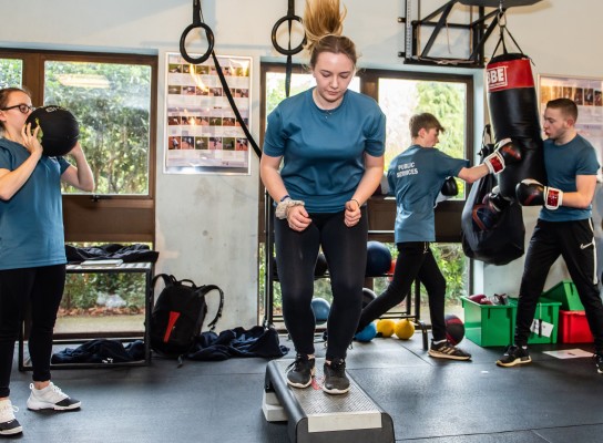 Students working in the gym