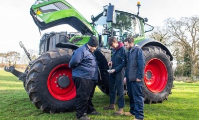 Agricultural Engineering students working with a tractor